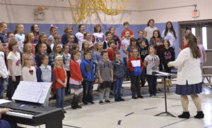 Students  honor veterans with music, displays at ceremony